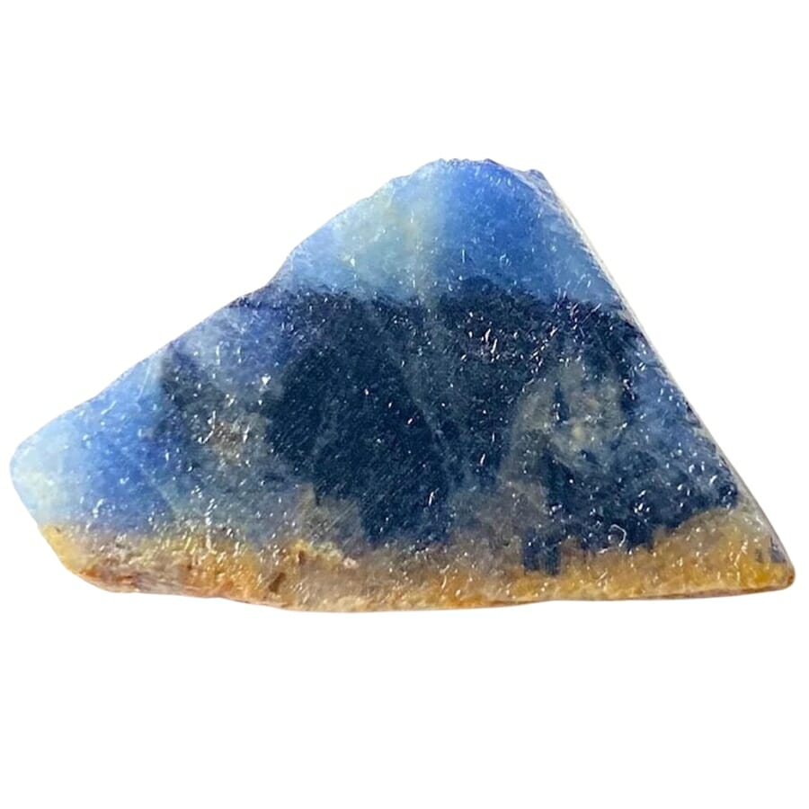 A stunning triangle-shaped raw sapphire with different blue hues