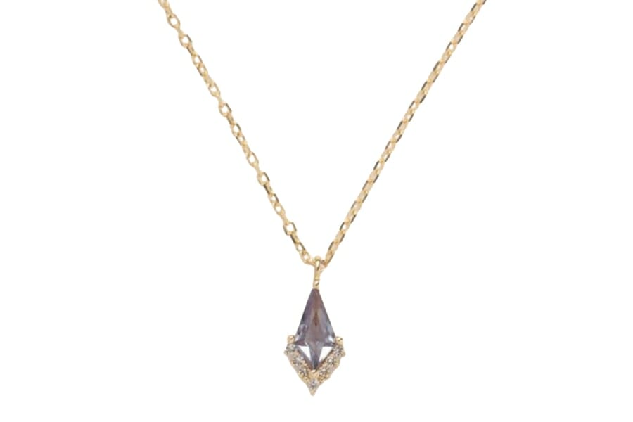 A gorgeous kite-shaped gray alexandrite necklace pendant with gold details
