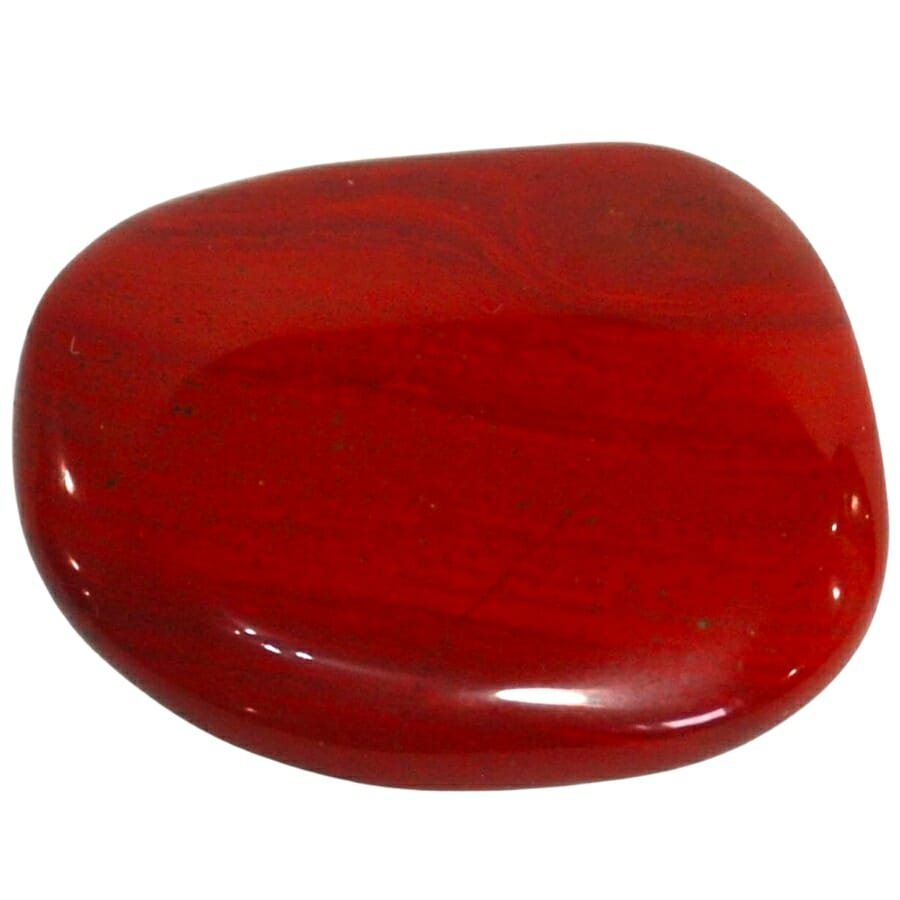 A natural red jasper palm stone