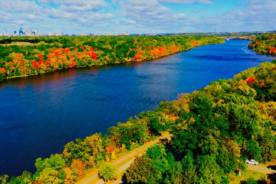 Aerial view of the Mississippi River and its vibrant surroundings