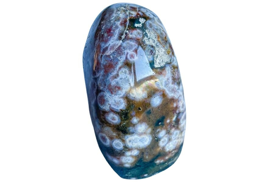 An Ocean Jasper crystal that perfectly captures the waves, the shores, the skies, and water of the ocean