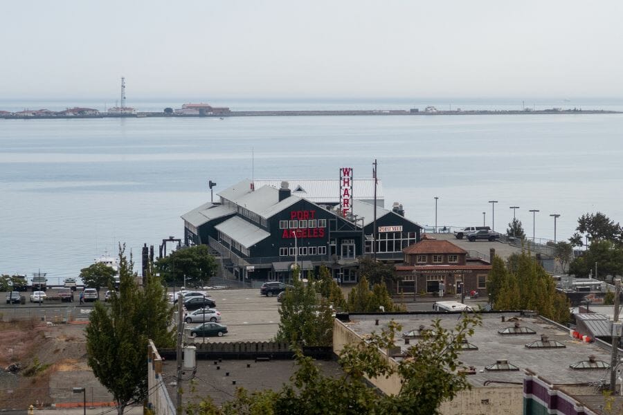 dark blue building against the backdrop of the ocean in Port Angeles in Clallam County