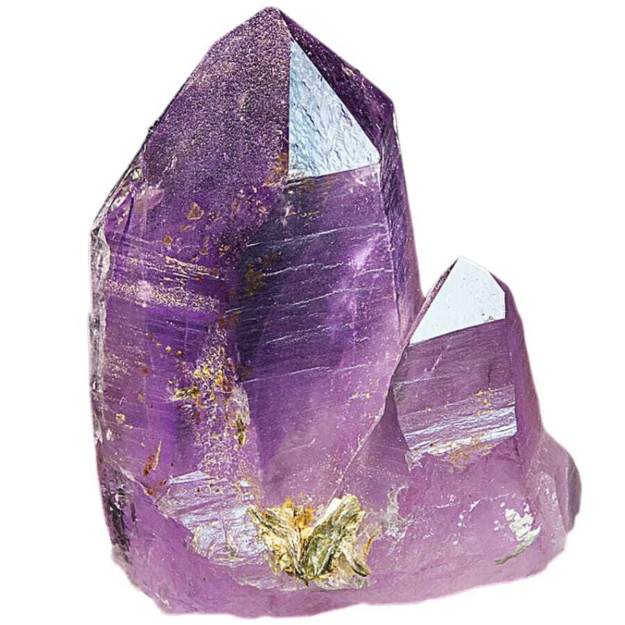 A gorgeous amethyst crystal with gold spots