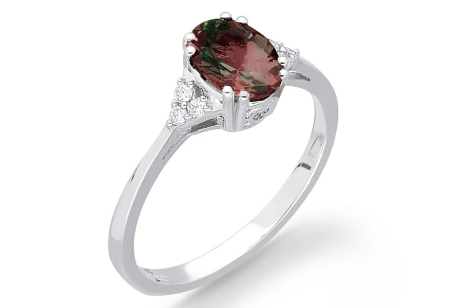 A stunning red alexandrite gem on a silver ring