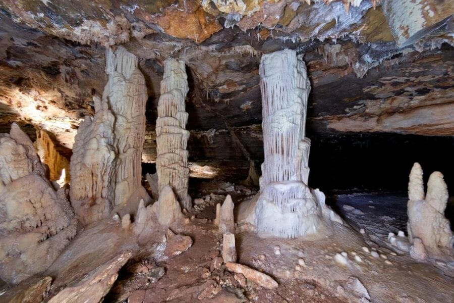 interior of a cave with stalactites and stalagmites