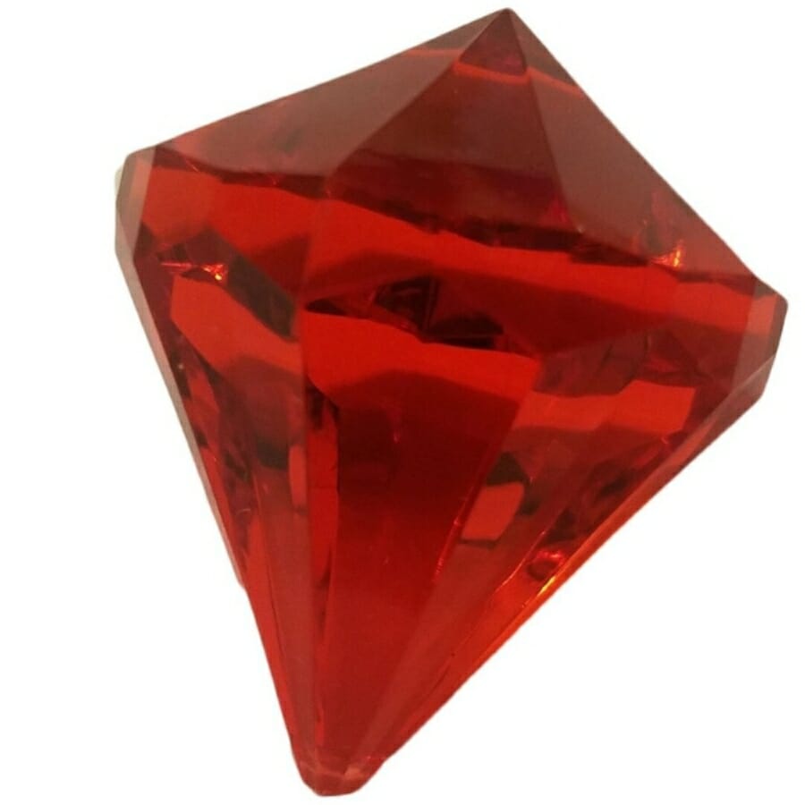 A diamond-shaped ruby with a smooth surface