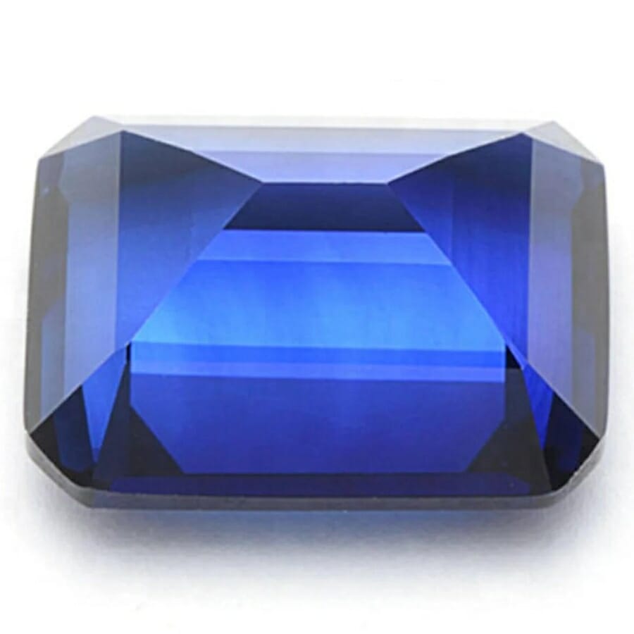 A lovely polished spinel gemstone showing different blue hues