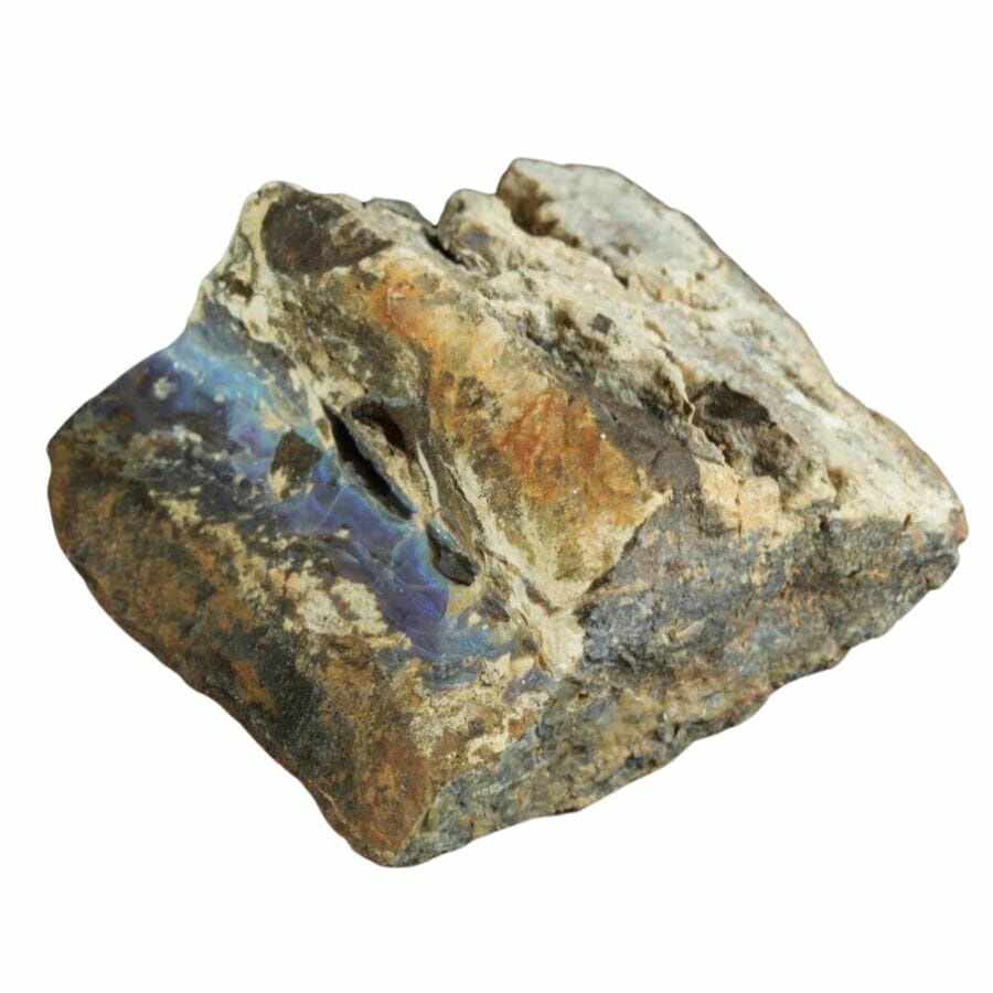 blue opal material in a piece of rough rock