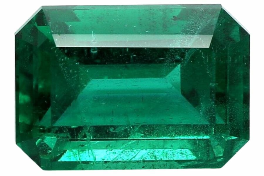 octagonal deep green emerald with inclusions