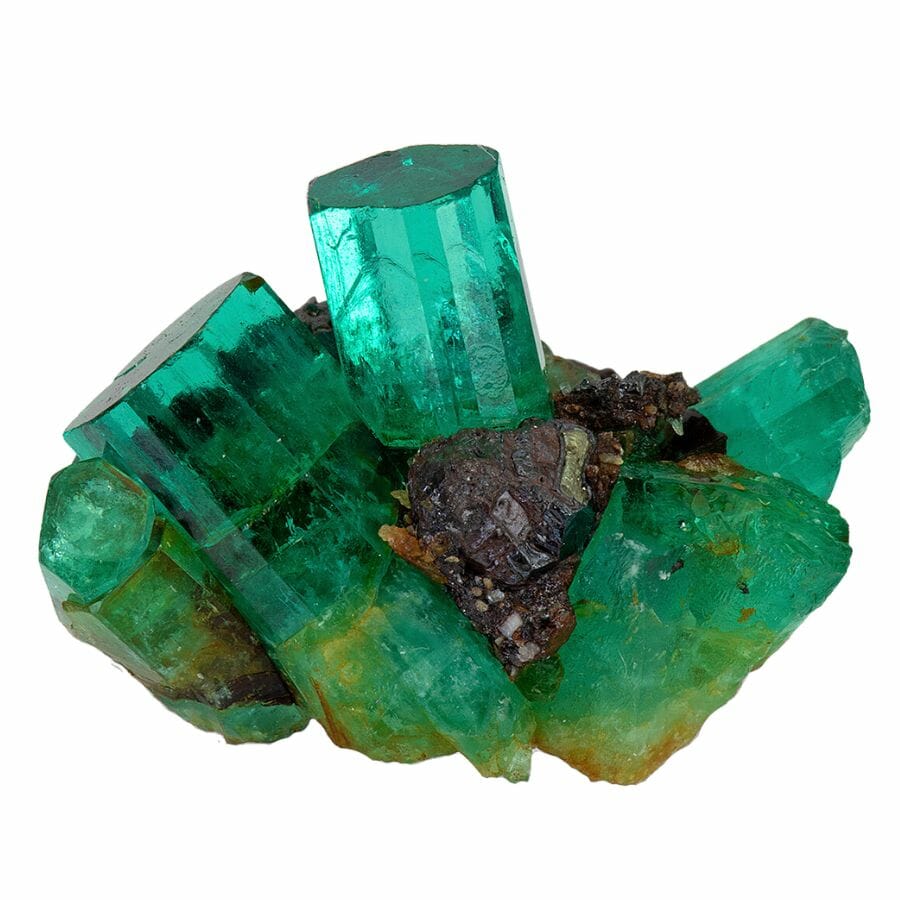 cluster of translucent green hexagonal emerald crystals