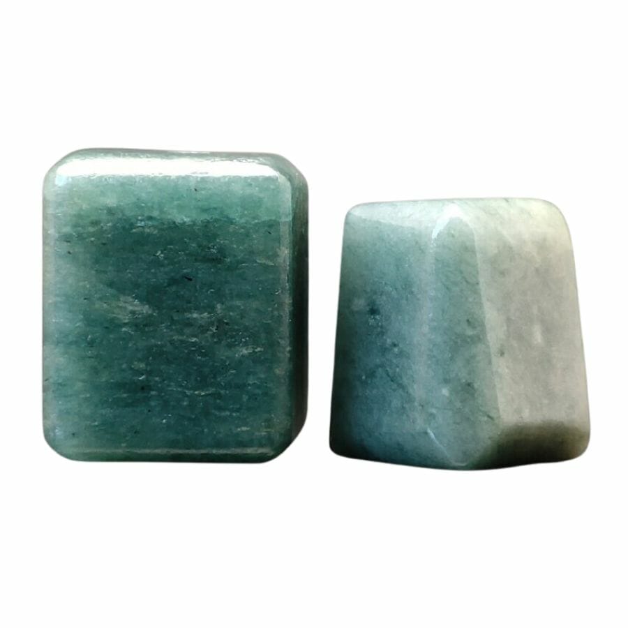 two polished green jadeite blocks