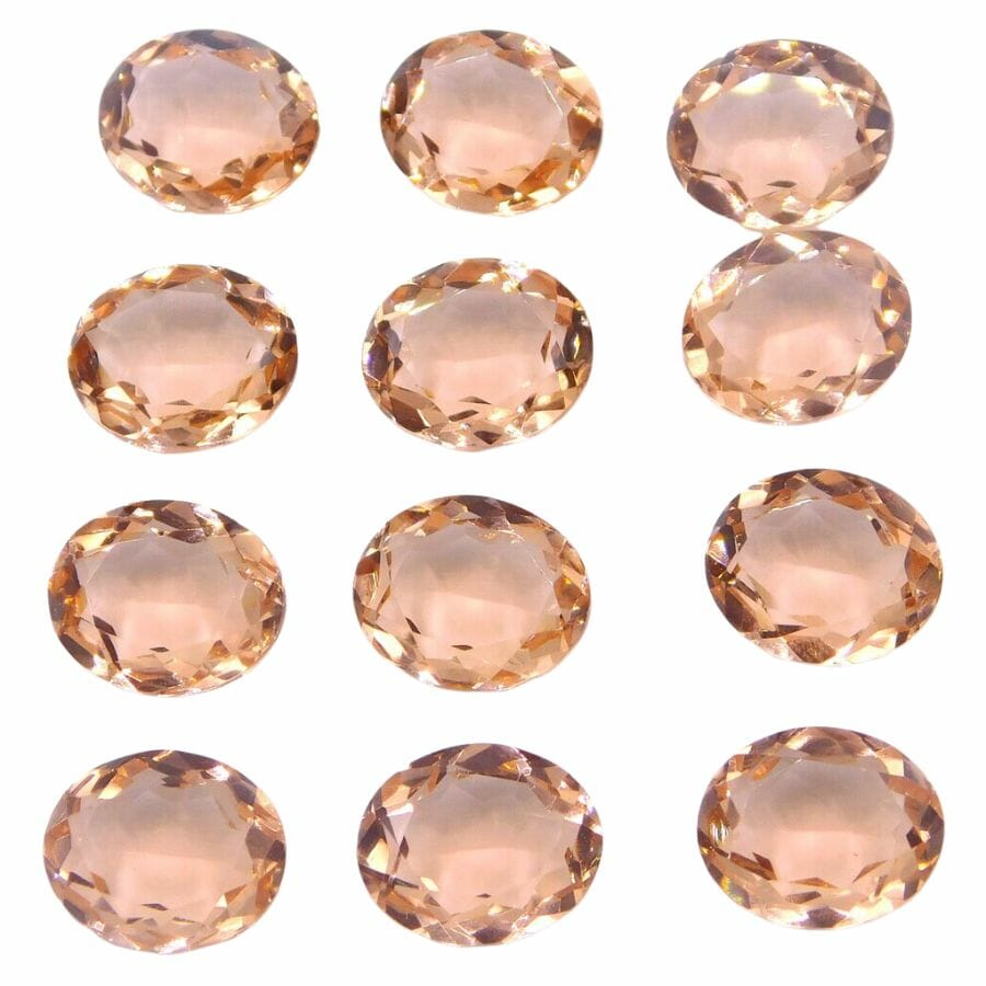 12 oval cut morganite gems with a peach hue