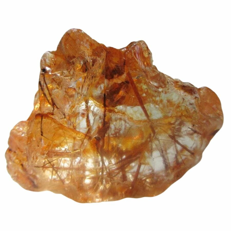quartz crystal with golden rutiles inside