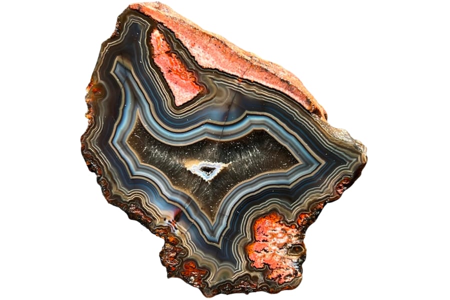 An agate with stunning banding of black, blue, and white and with a tiny floater in the middle