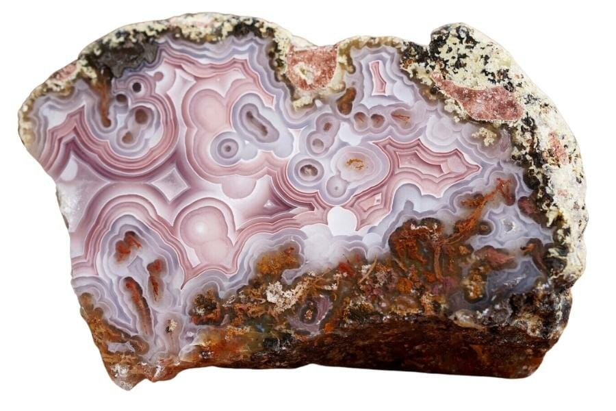 A stunning pink agate specimen with unique swirls of bands