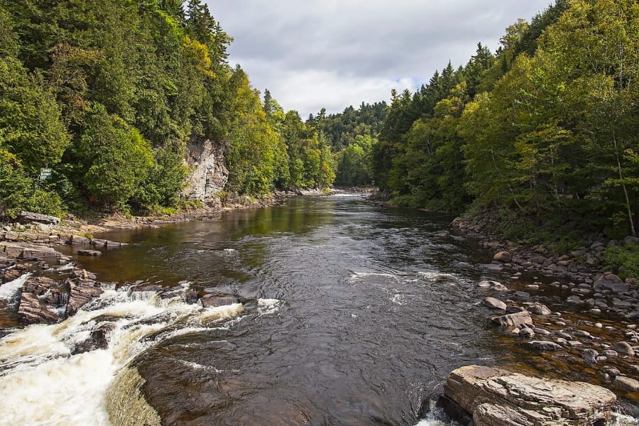 Gushing waters of Canadian River surrounded by rocky landscapes