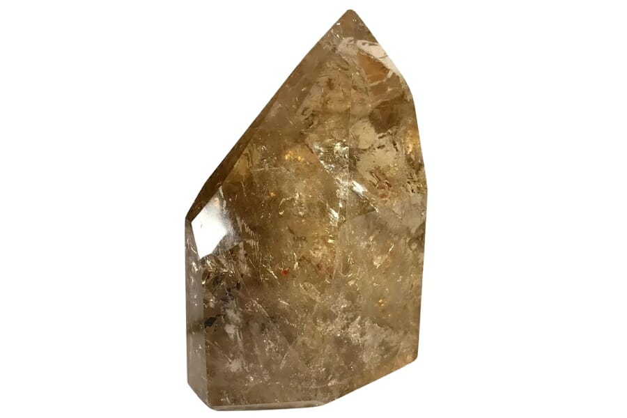 A mesmerizing polished free form citrine crystal with a pointy end