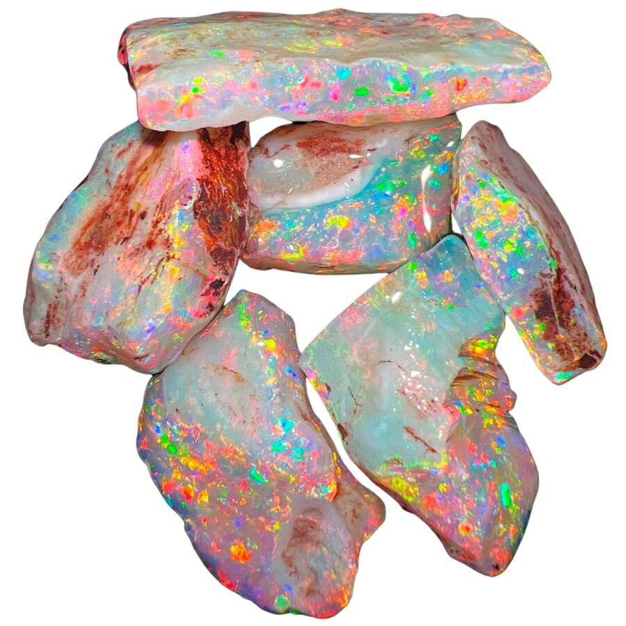 Pieces of raw opal showing uneven colors