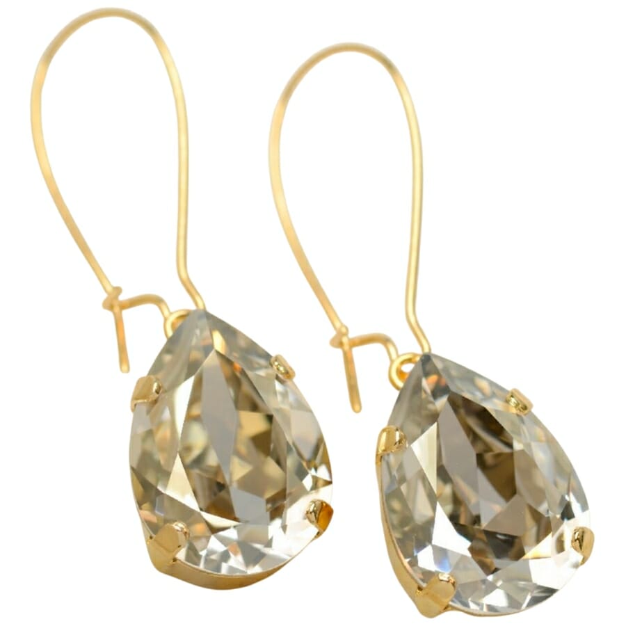 A pair of earrings made with Swarovski crystal pear fancy stones