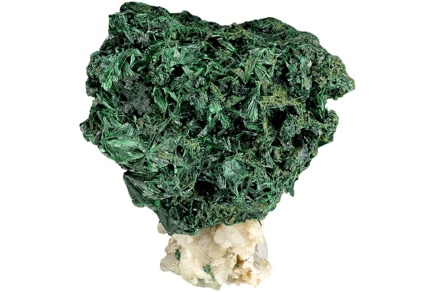 Green needlelike malachite in a large cluster with quartz