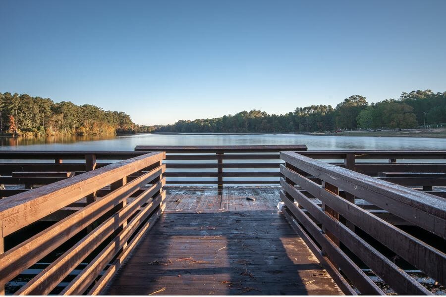 wooden pier facing a lake
