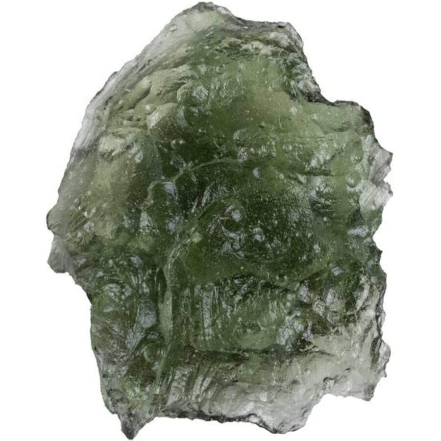 A raw moldavite specimen exhibiting translucency and an olive green hue