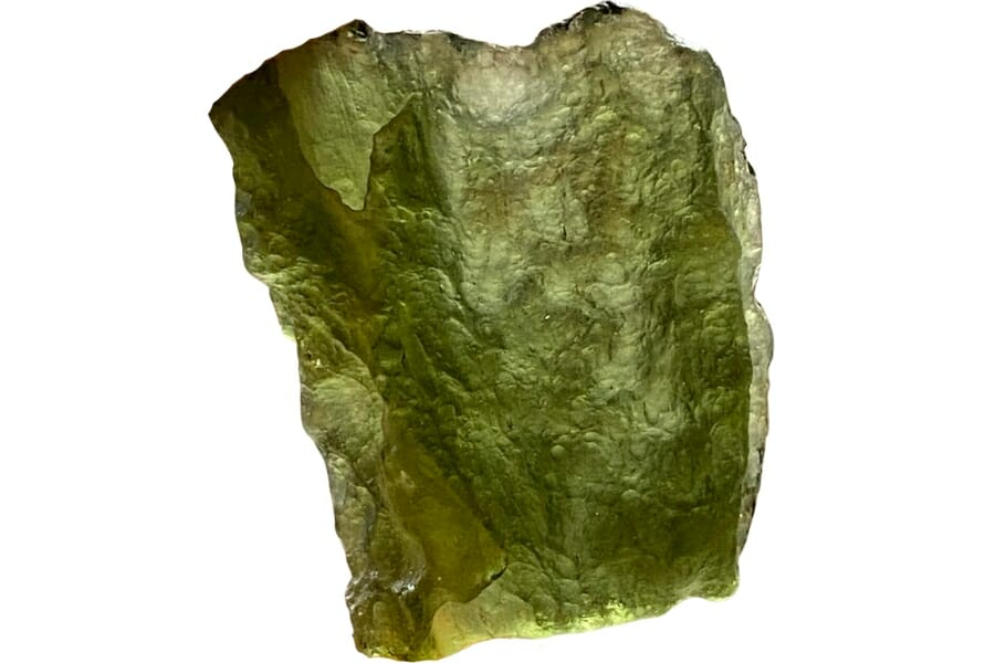 A translucent piece of olive green moldavite