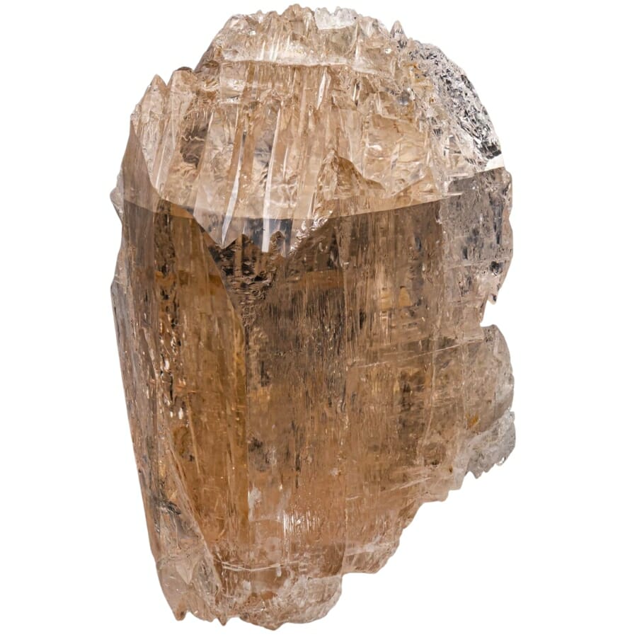 Transparent, light sherry-colored topaz with the appearance of an etched ice cube