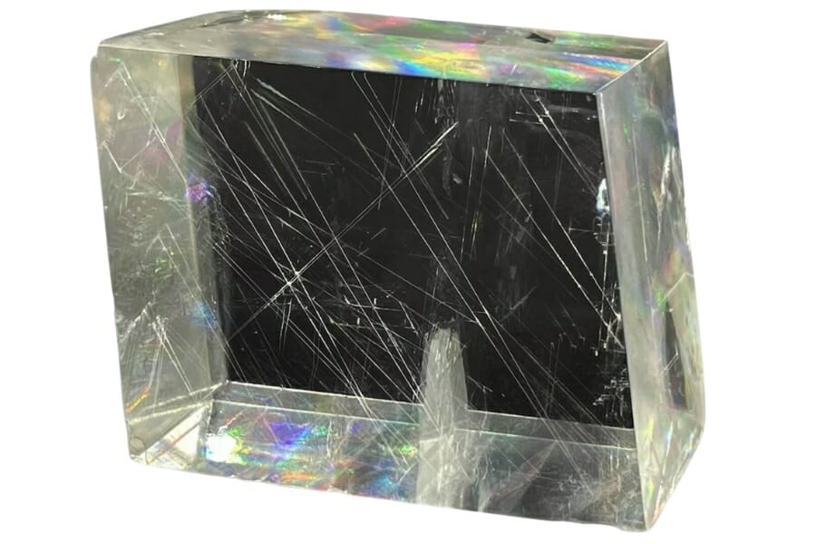 A transparent and radiant cubic Iceland Spar with a rainbow shine