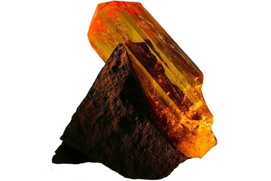 A fine rich orange Imperial topaz on matrix