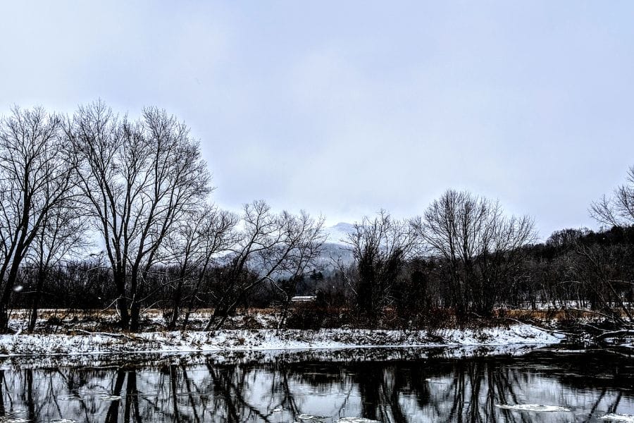 snow on the ground of the banks of the Lamoille River