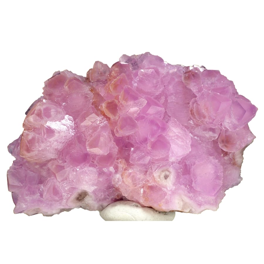 A stunning natural piece of pink calcite with crystal clusters