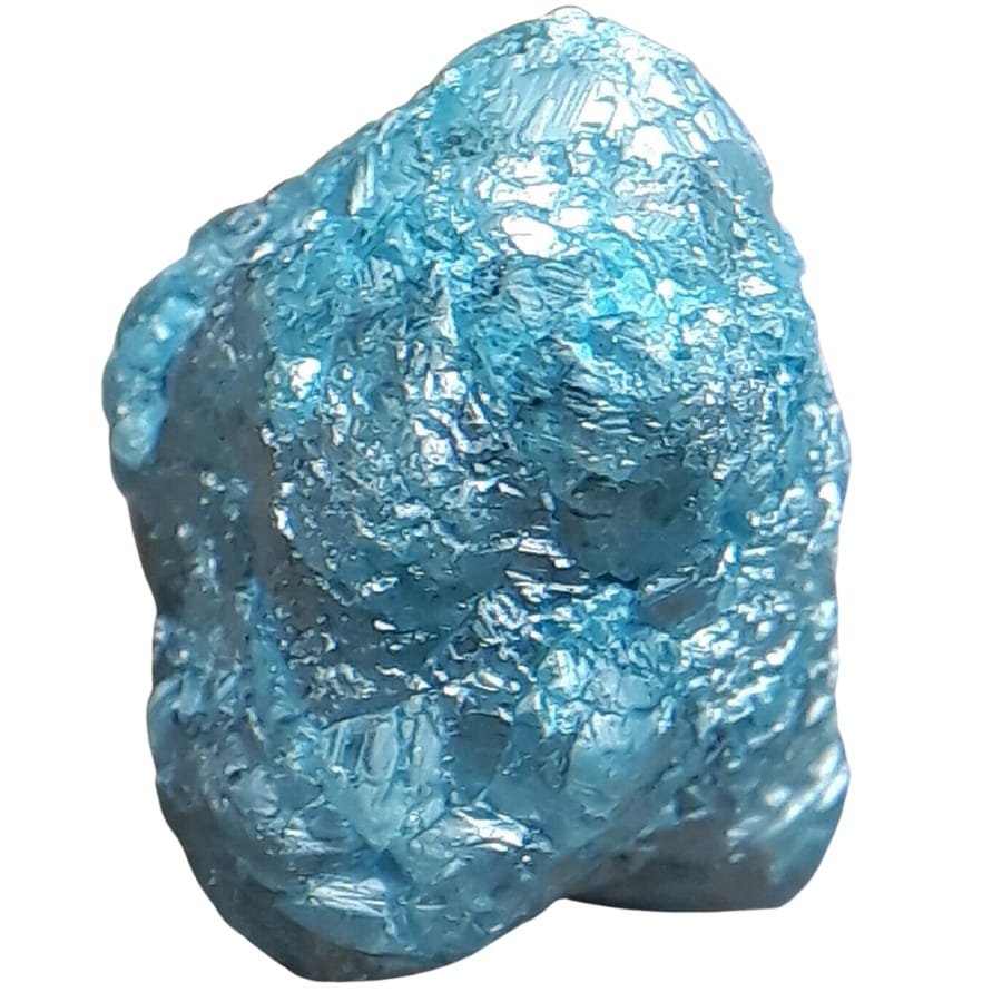 A rough blue diamond specimen with a shiny surface