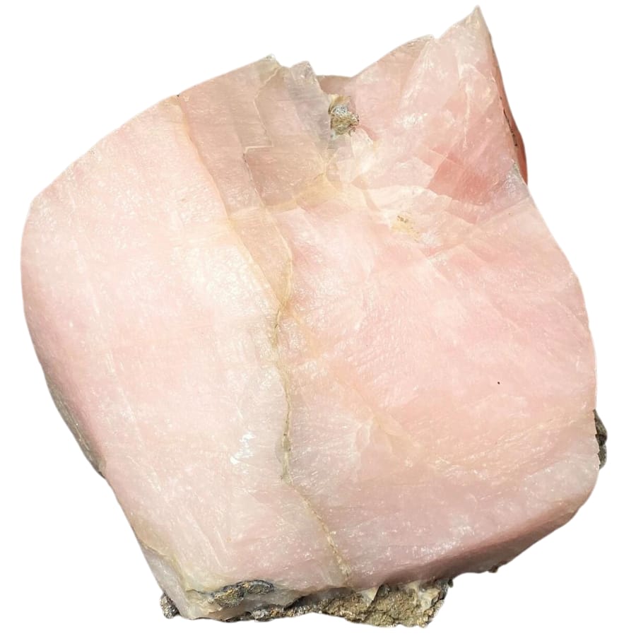 A shiny and gemmy-like surface of a raw pink calcite