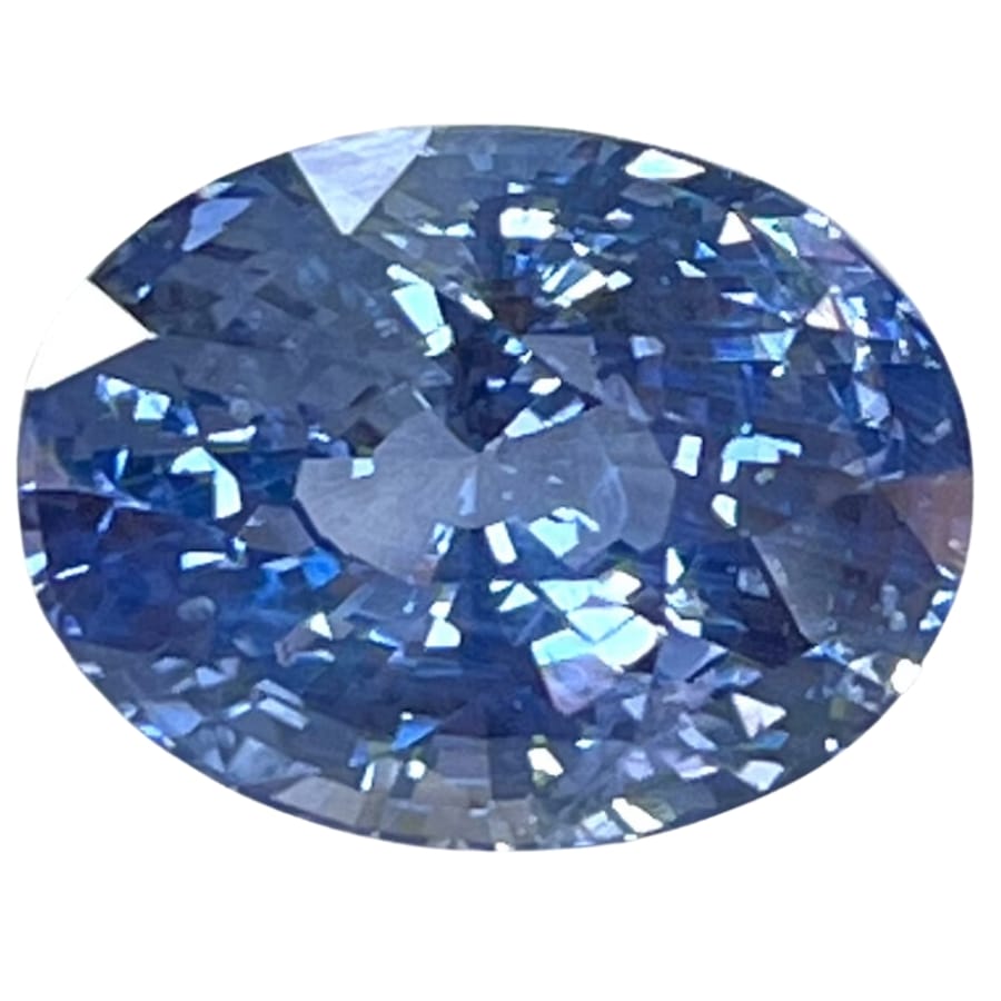 An oval cut polished sapphire crystal gemstone