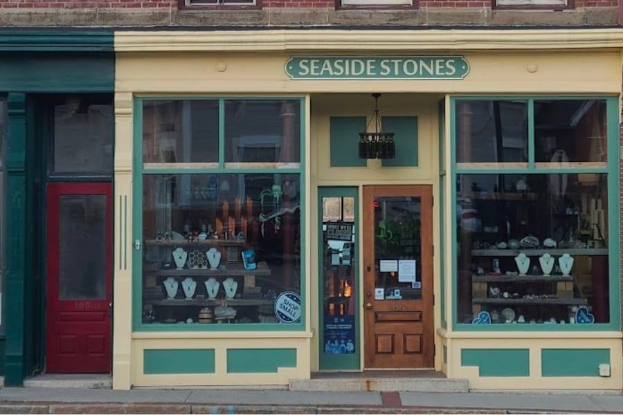 Front store window and entrance door of Seaside Stone