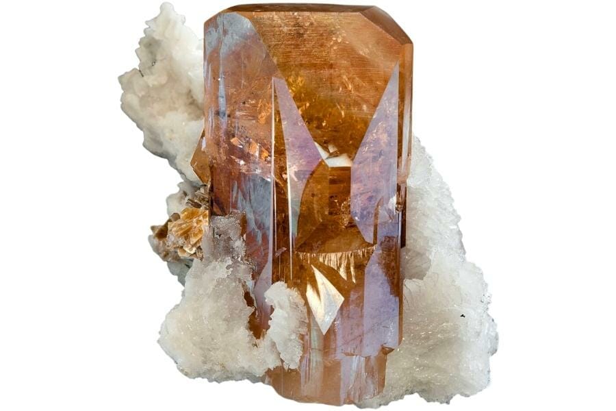 A honey-orange topaz showing incredible luster and gemminess