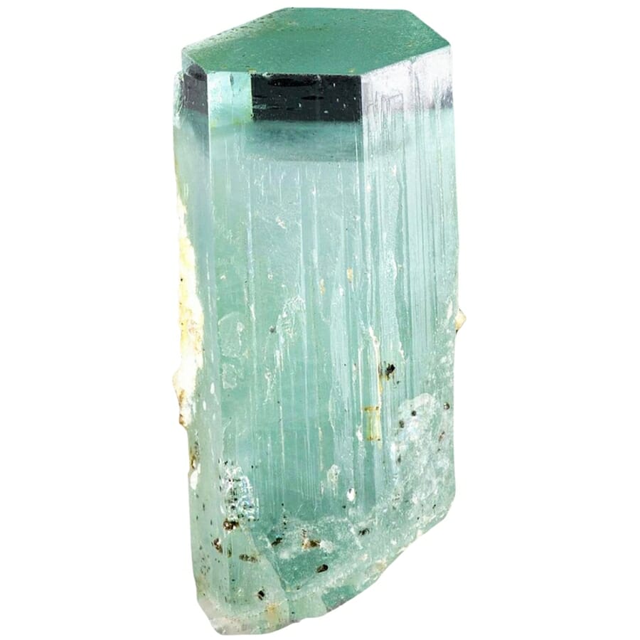 A beautiful loose glassy aquamarine crystal with visibly rough surface