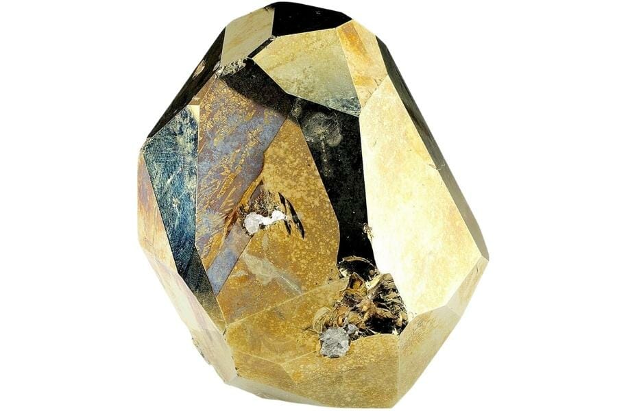 A brilliant sharp loose crystal of pyrite with micro-chipping and tarnish on the side