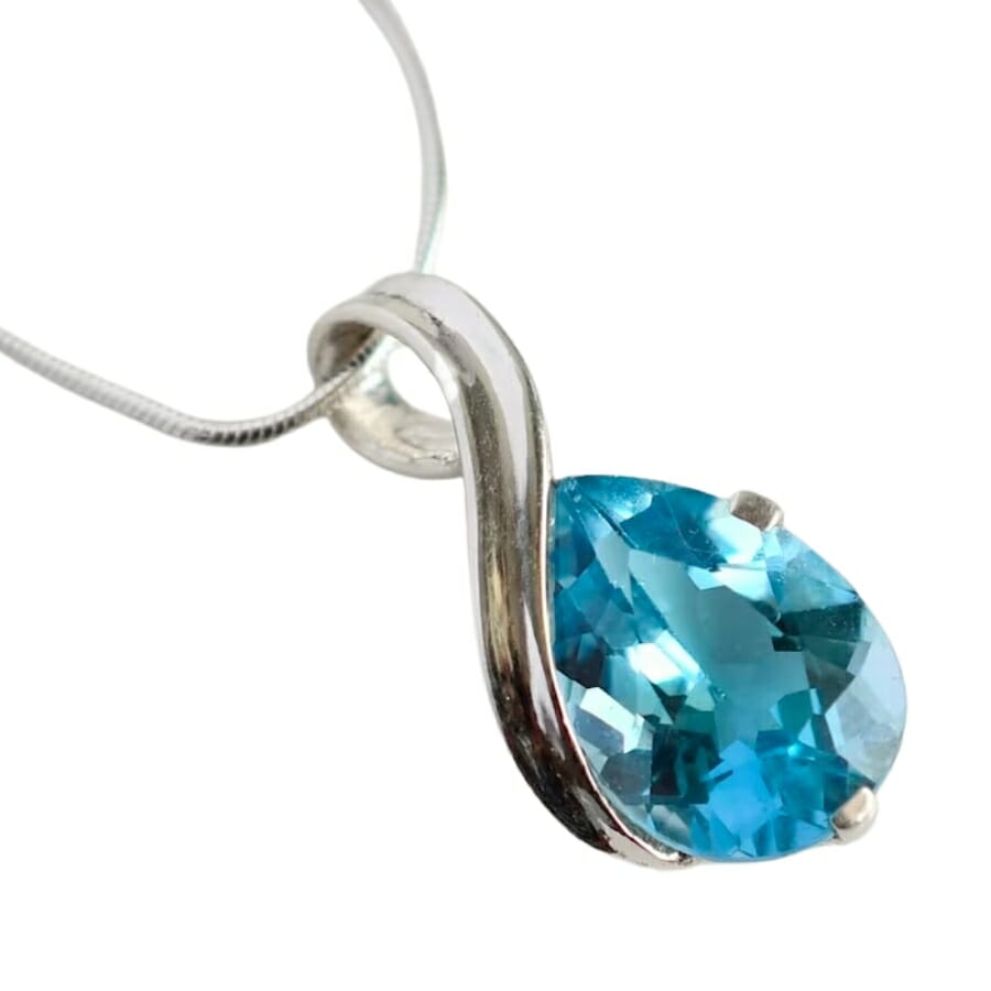 Beautifully-cut blue topaz set on a silver pendant
