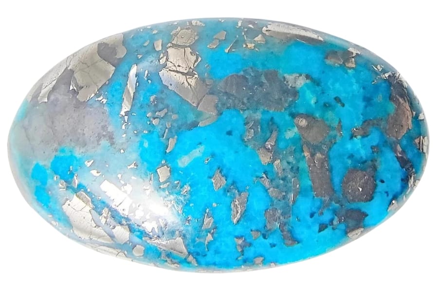 A beautiful polished turquoise gemstone with silver spots