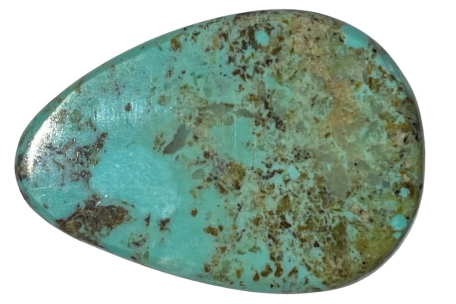 A tumbled and polished turquoise teardrop cabochon