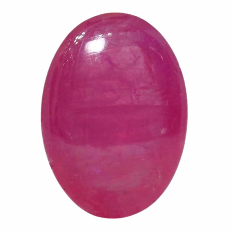 oval pinkish red ruby cabochon