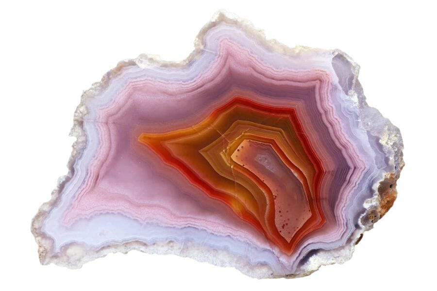 agate cross section with red, orange, pink, and lavender bands