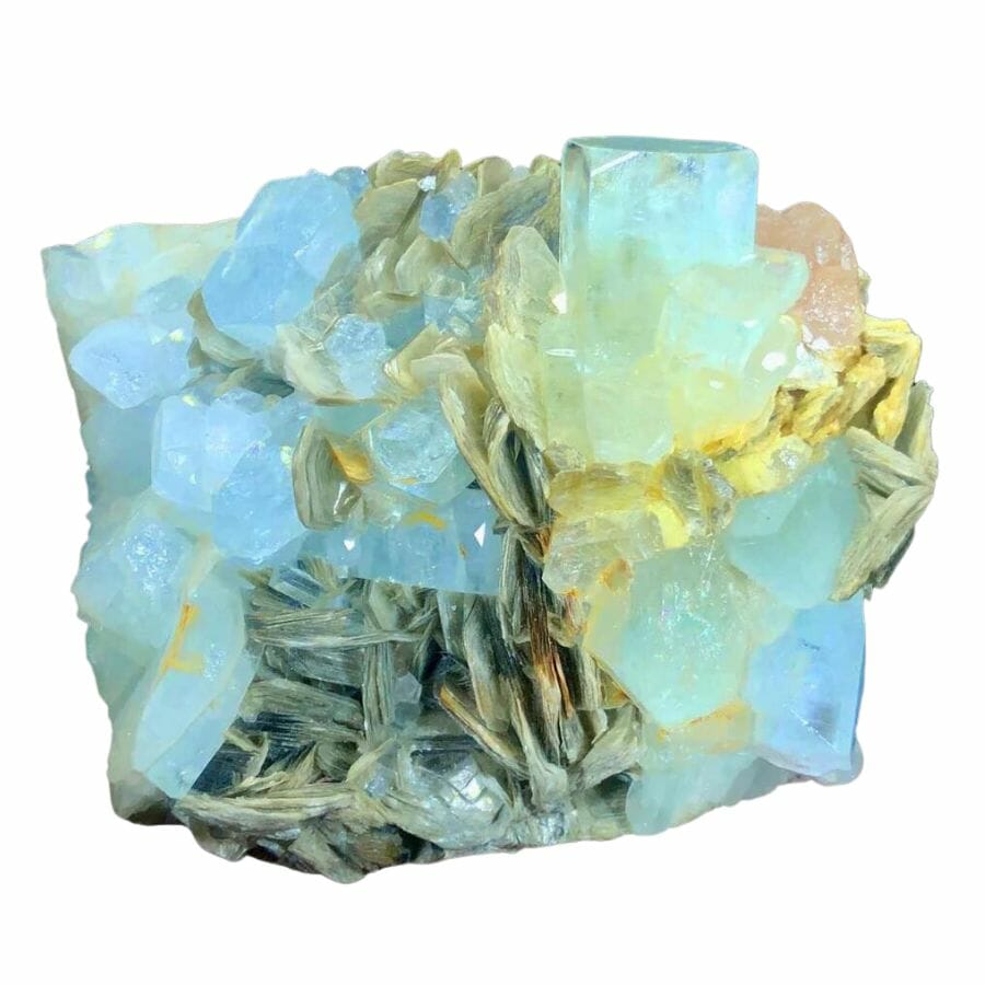 cluster of gemmy bright sky blue aquamarine crystals in a matrix