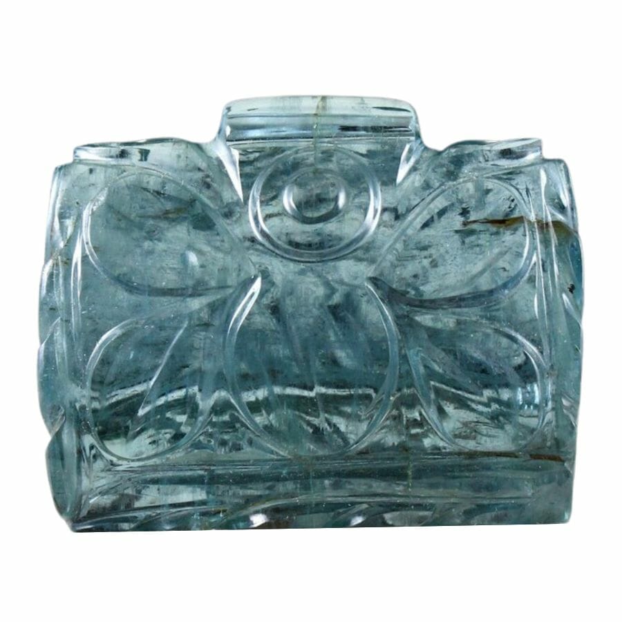 blue aquamarine with flower carvings