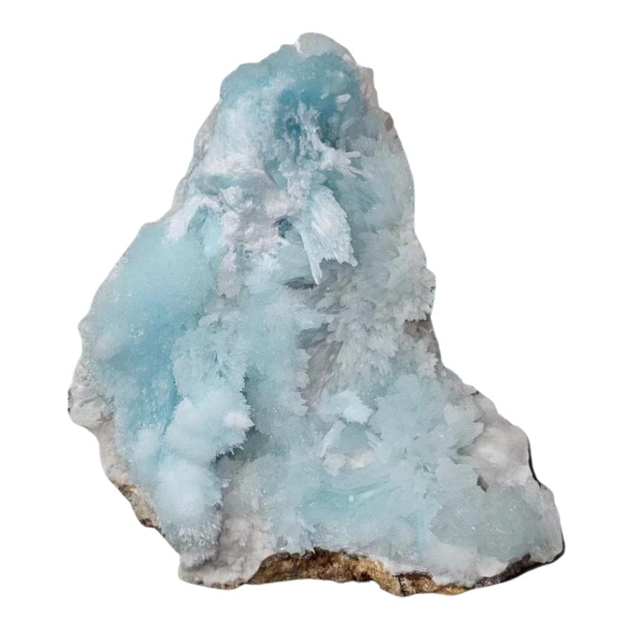 pale blue aragonite crystals on a rock