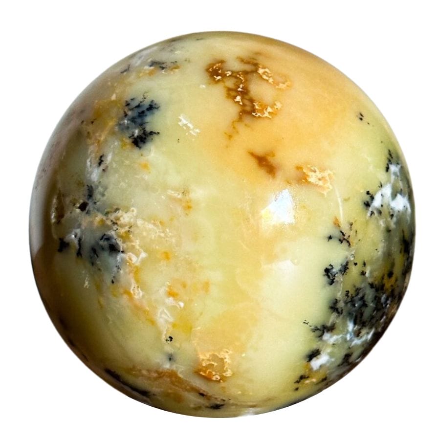 dendritic opal sphere with a yellow base and black and brown dendrites