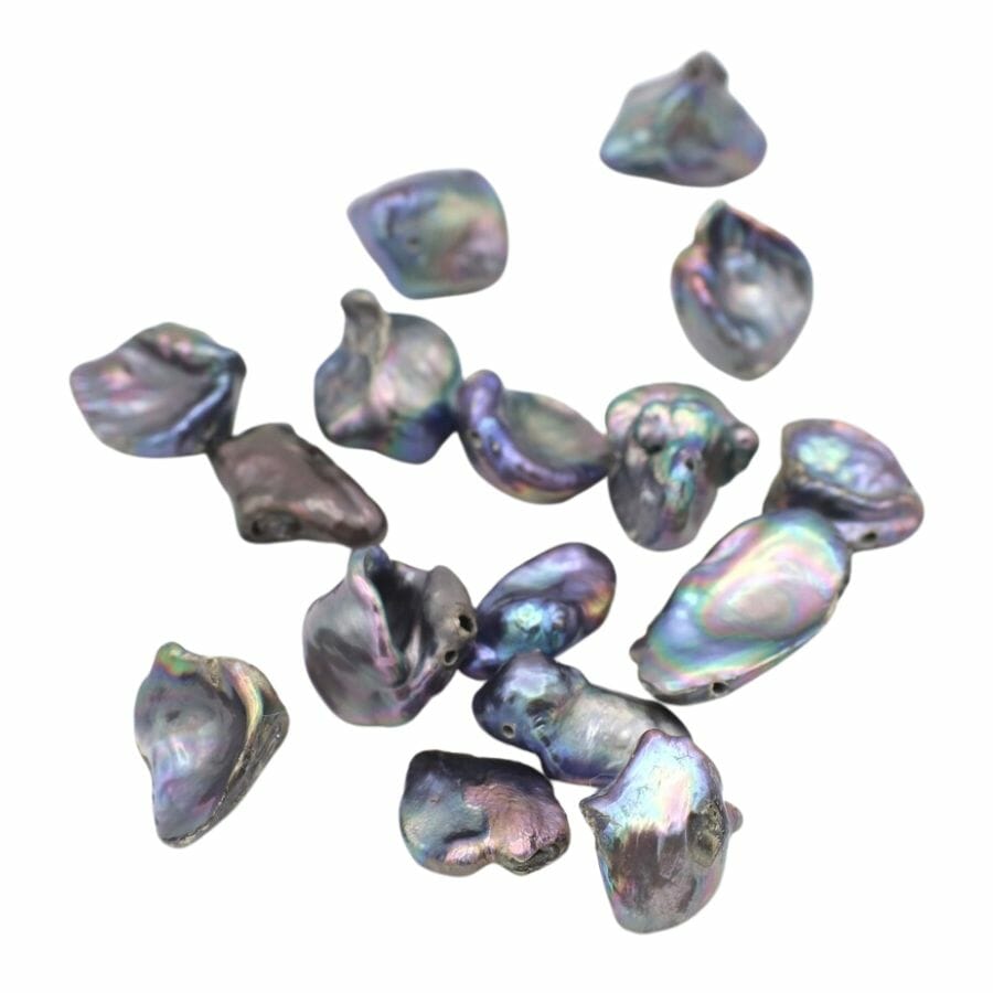 several iridescent Keshi pearls with irregular shapes