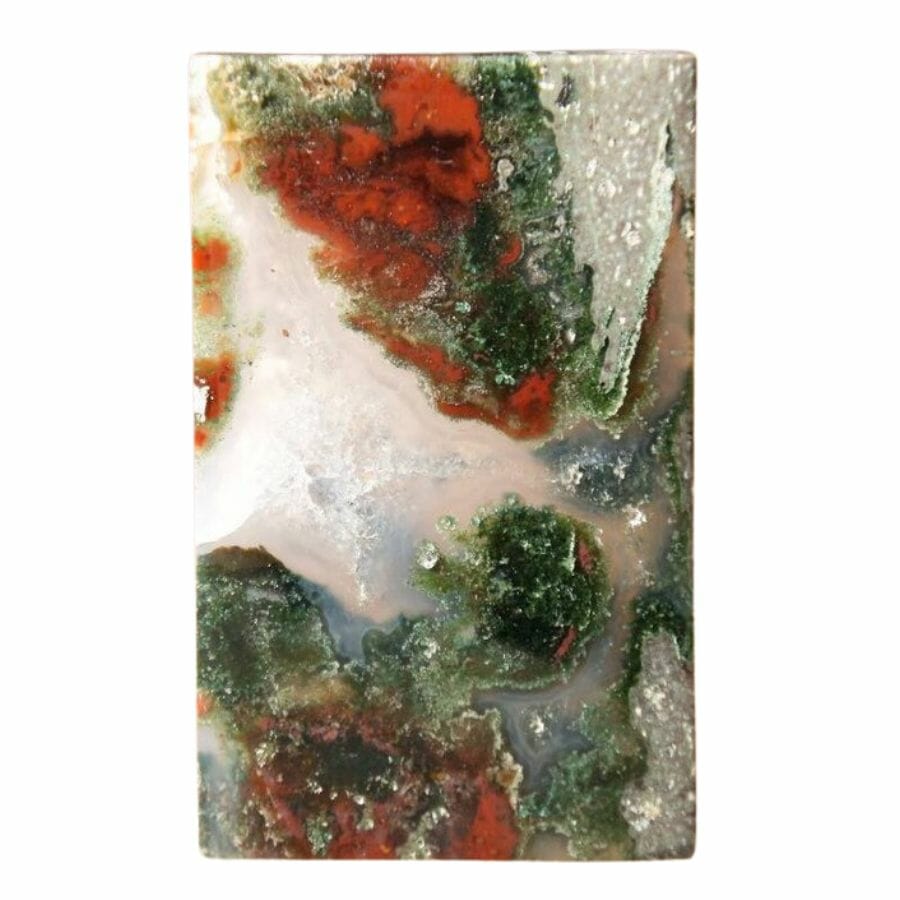 rectangular moss agate cabochon with green and red inclusions